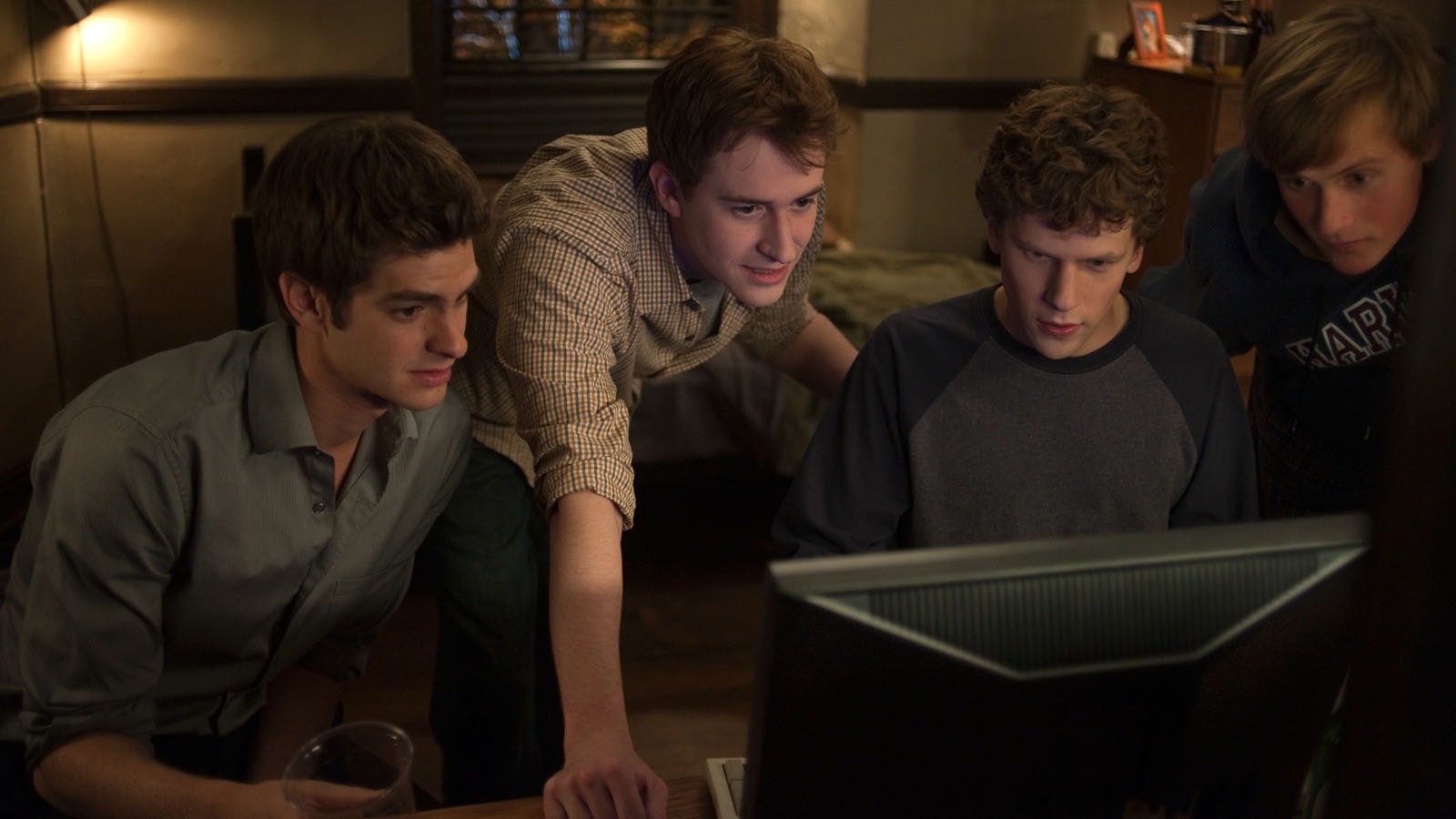 The Social Network L-r, Andrew Garfield, Joseph Mazzello, Jesse Eisenberg and Patrick Maple in Columbia Pictures' "The Social Network."